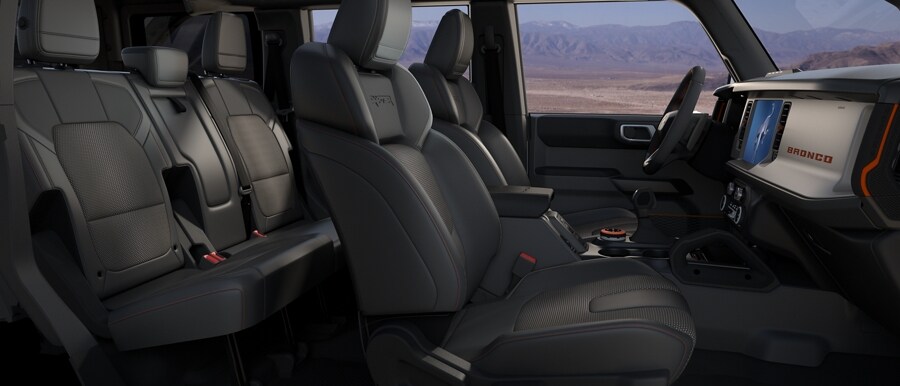 Interior of 2024 Ford Bronco® Raptor® showing available leather-trimmed seats in Black Onyx