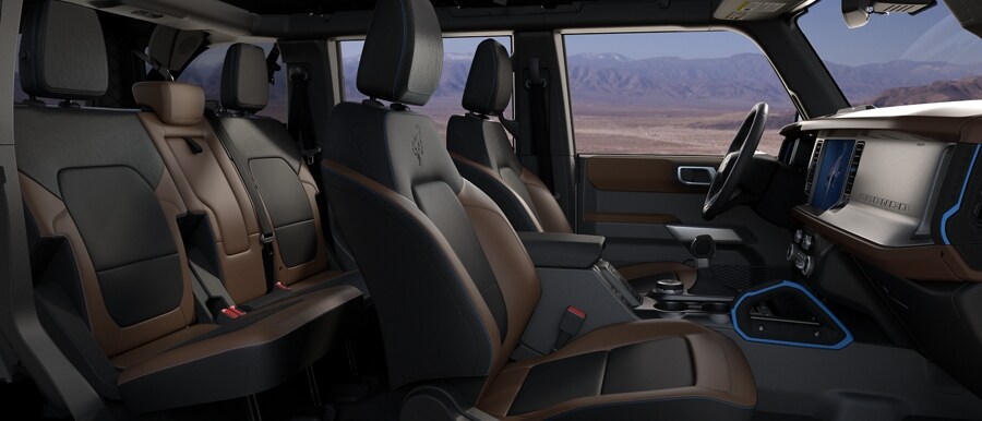 Interior of 2024 Ford Bronco® SUV with available leather-trimmed seats in Roast with Black Onyx