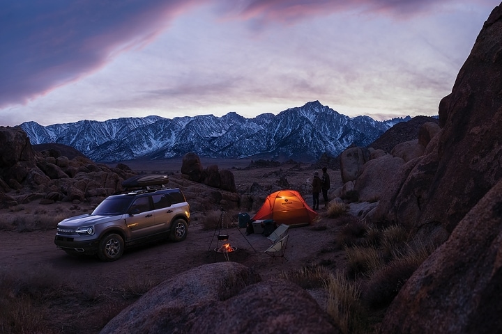 2023 Ford Bronco® Sport parked in a rustic area with a tent