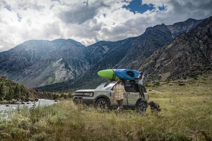 2023 Ford Bronco® Sport parked on the grass next to a river