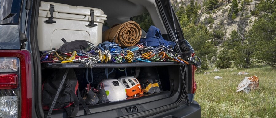 2023 Ford Bronco® Sport model with liftgate open and showing camping equipment
