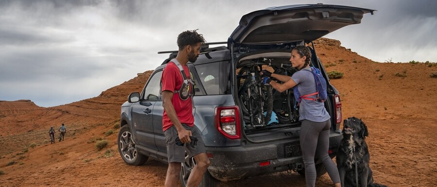 Couple loading bikes into a 2023 Ford Bronco® Sport SUV