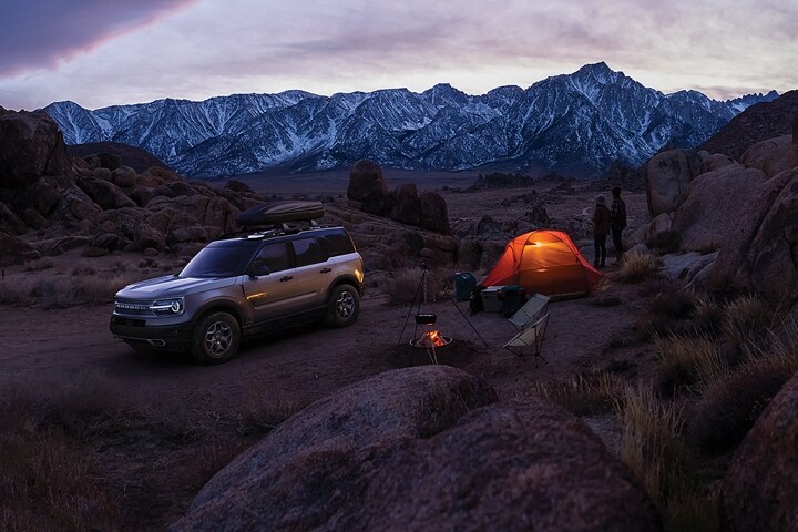 2023 Ford Bronco® Sport parked in a rustic area with a tent