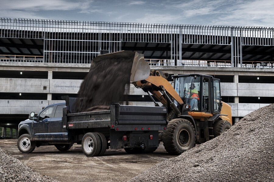 2023 Ford Super Duty® with dump truck upfit on construction site