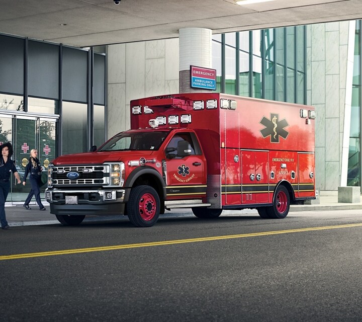 2024 Ford Super Duty® Chassis Cab parked at the curb with an ambulance upfit