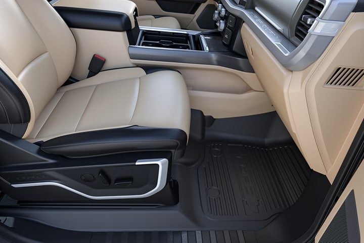 Close-up of the truck interior showing the all-weather floor mats
