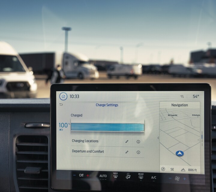 2023 Ford E-Transit™ Front Interior with Screen showing navigation searching for charging stations