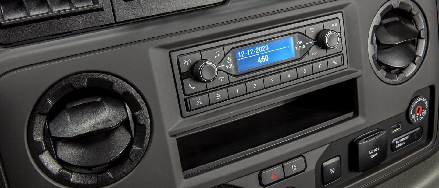 Close-up of the 2024 Ford E-Series Cutaway center panel radio