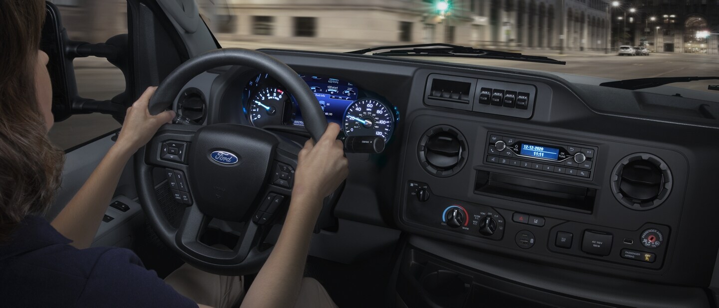 Interior view of the 2024 E-Series Cutaway with a person behind the wheel