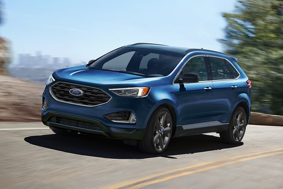2022 Ford Edge with Adventure Package drives on a curvy road