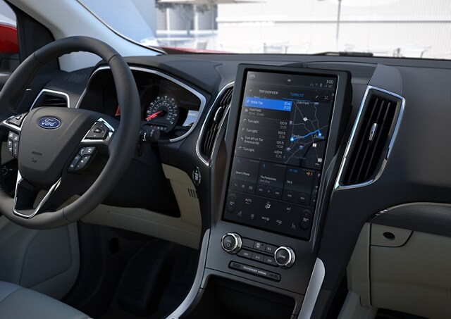 La consola, el volante, el grupo de instrumentos y la pantalla táctil de 12 pulgadas de la SUV Ford Edge® 2023