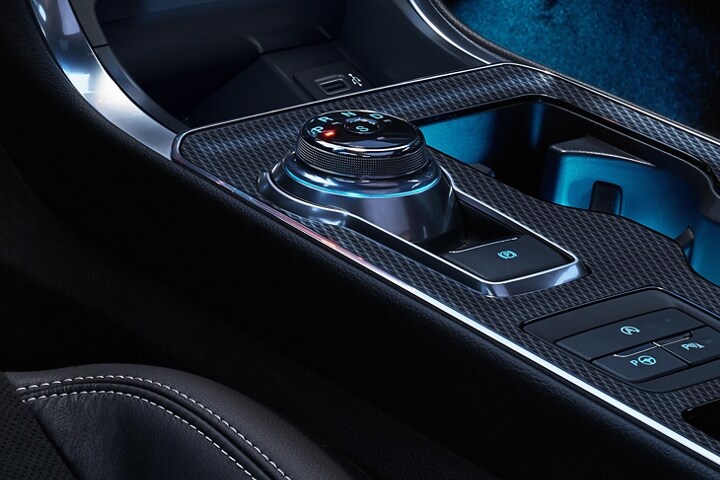 Close-up of the rotary gear shift dial inside a 2024 Ford Edge® SUV