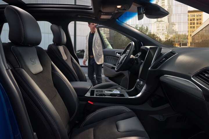 Interior of a 2024 Ford Edge® ST model with leather-trimmed seats and perforated Miko® inserts