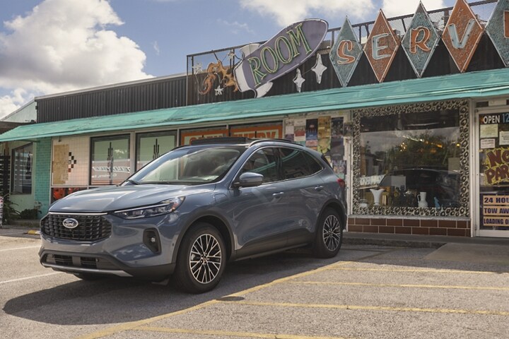 A 2023 Ford Escape® parked in front of a store
