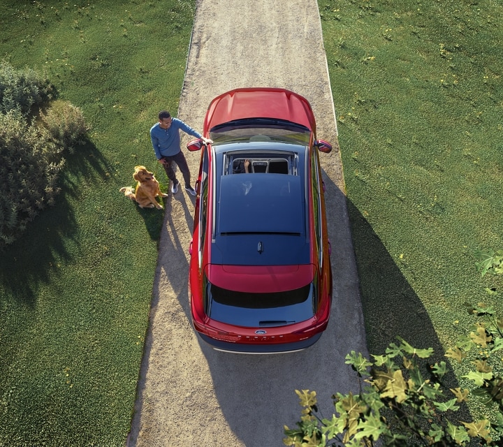 Overhead view of a red 2024 Ford Escape parked on country road