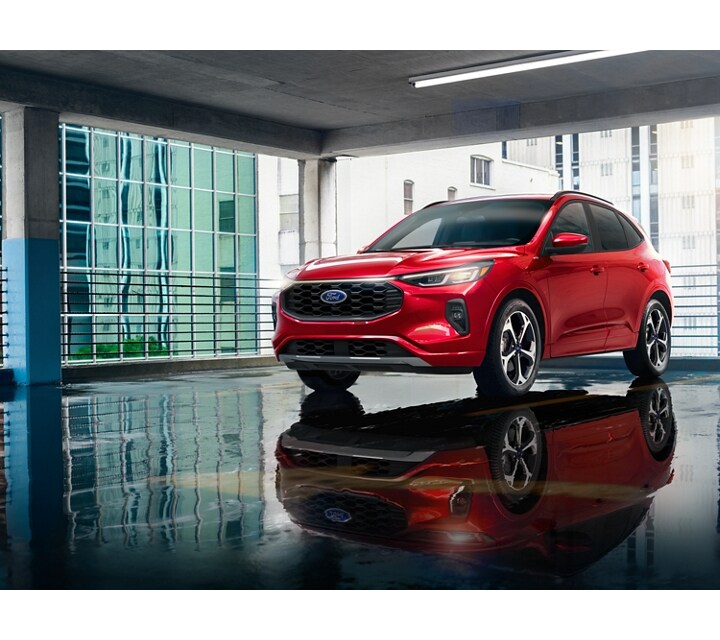 2024 Ford Escape® ST-Line Elite SUV parked in an immaculate urban garage complex