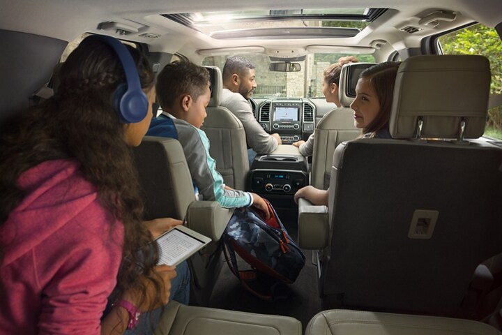 2021 Ford® Expedition interior in Medium Soft Ceramic shown here full of passengers