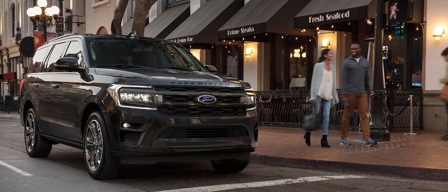 A 2023 Ford Expedition being driven down an urban road