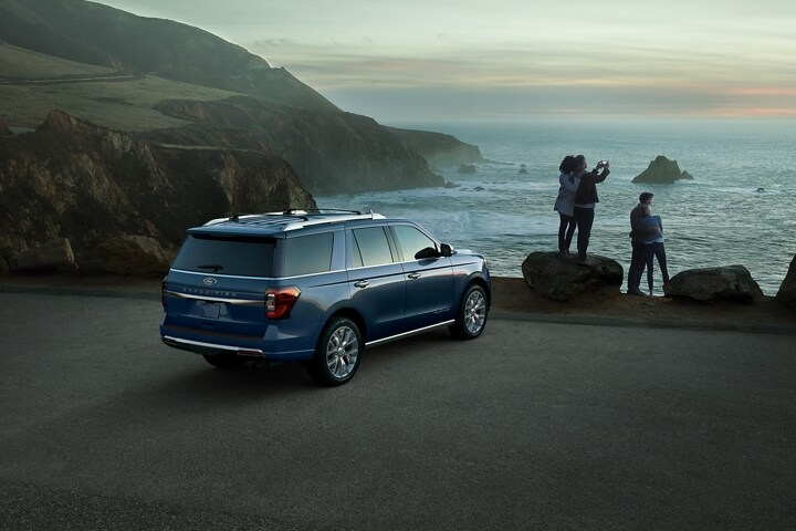 A 2023 Ford Expedition SUV parked next to a body of water