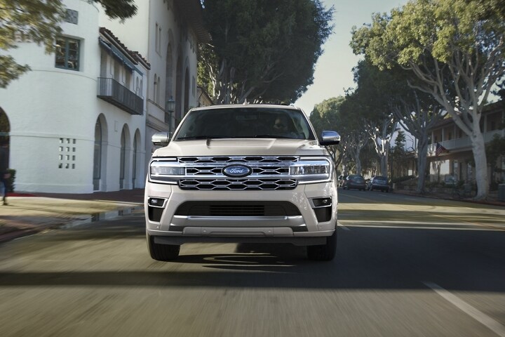A 2023 Ford Expedition SUV being driven down an urban street
