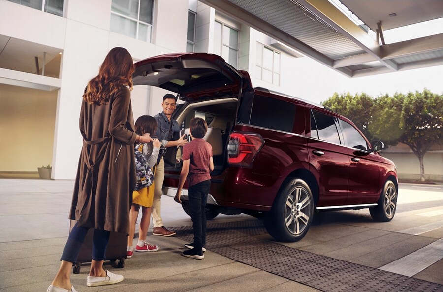 A family loads up the back of a 2024 Ford Expedition