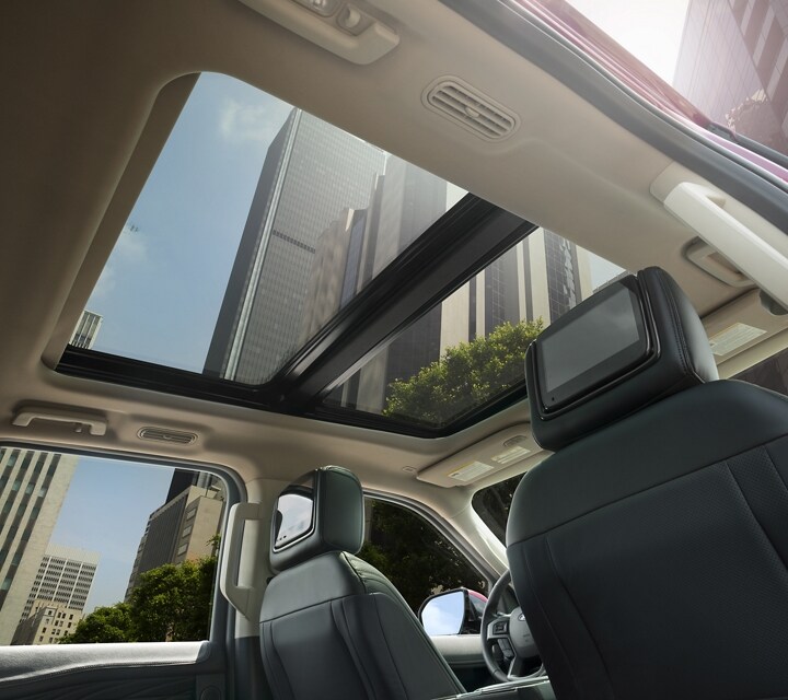 Interior close-up of the 2024 Ford Expedition Panoramic Vista Roof® panels and their view