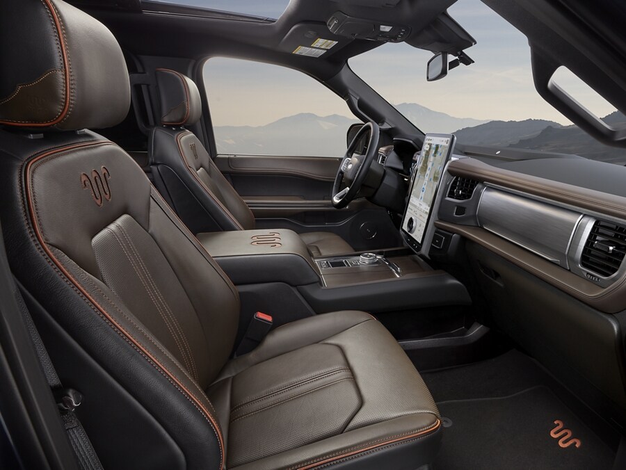 Interior side view of the front seat and driver dash of the 2024 Ford Expedition