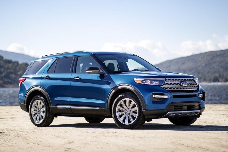 2023 Ford Explorer® Hybrid SUV parked by a lake