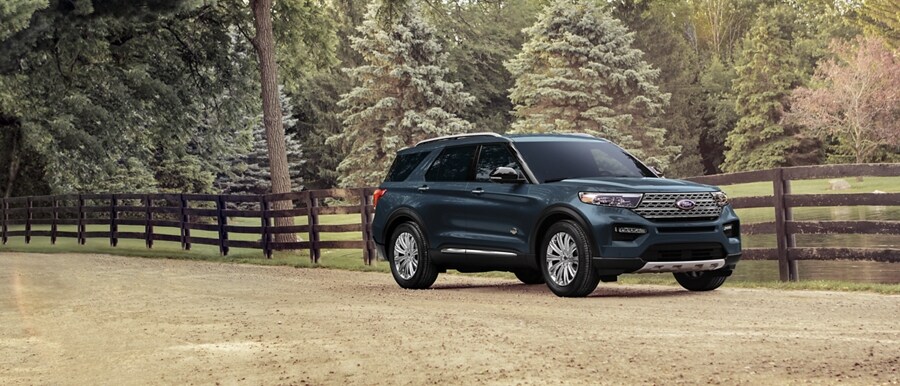 2023 Ford Explorer® King Ranch® model parked next to a pond