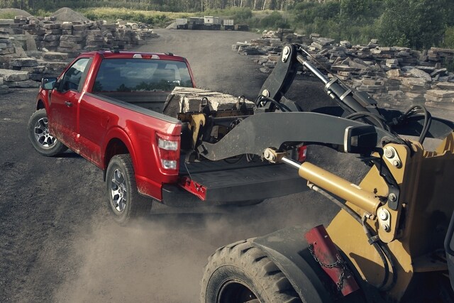 A Ford® F-150 getting a load of stone in a quarry