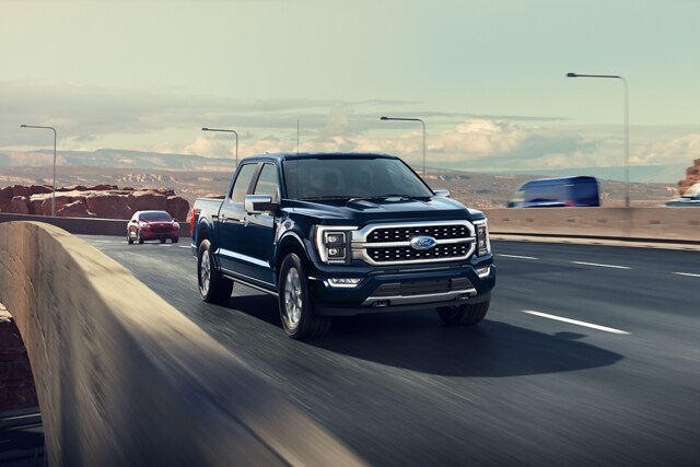 A 2023 Ford F-150® being driven on a highway