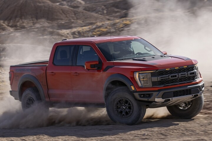A 2023 Ford F-150® Raptor® being driven off-road in the desert
