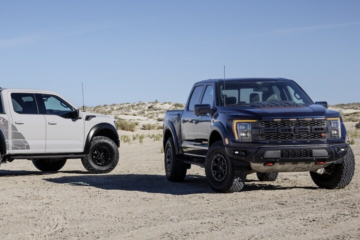 Image of the 2023 Ford F-150® Raptor R™ and Raptor® parked in the desert
