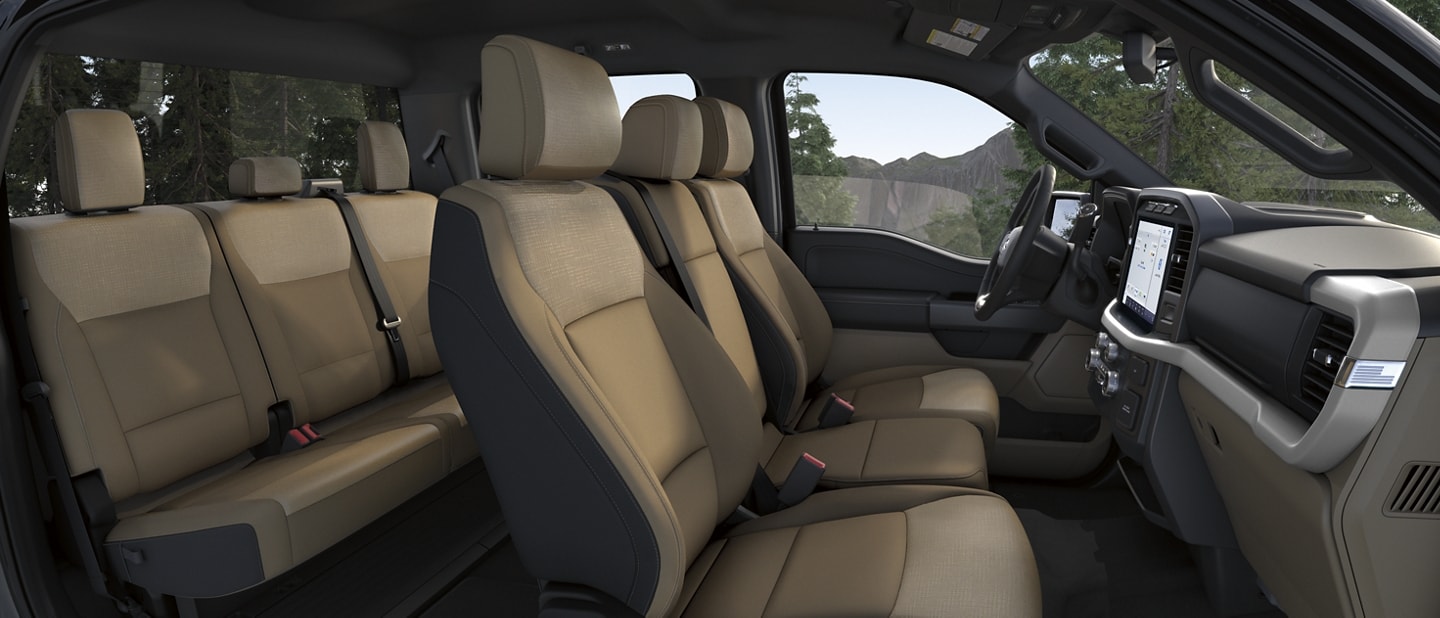 Interior image highlighting the leather-trimmed seats and dash panel of a 2023 Ford F-150®