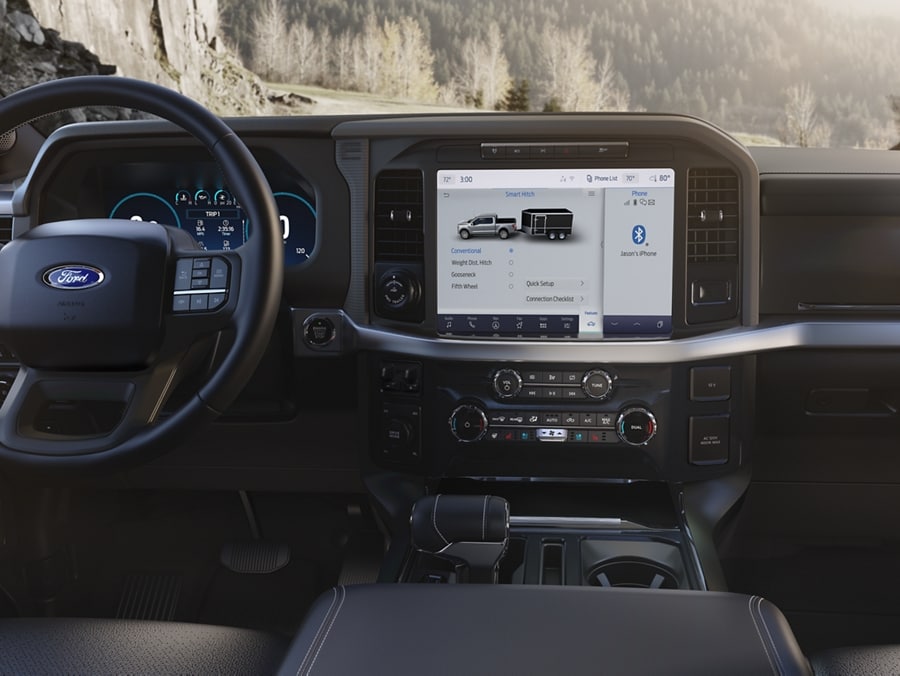 Close-up of the 12-inch LCD touchscreen display highlighting the Smart Hitch feature