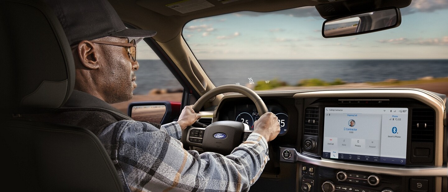 Interior of a 2024 Ford F-150® King Ranch® pickup showcasing the 12-inch LCD touchscreen display