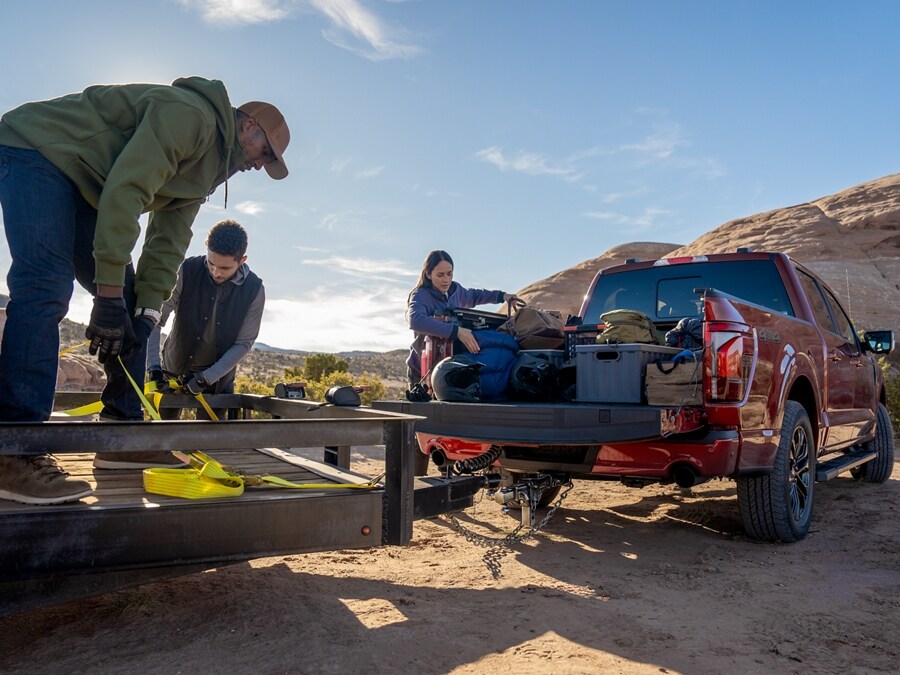 equipment being loaded with a trailer on to the adaptive suspension 4x4 F-150