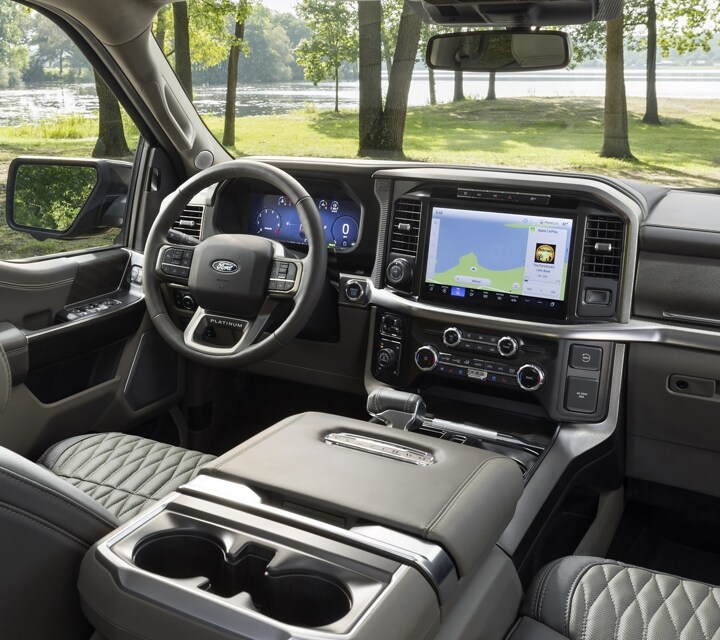 Interior of a 2024 Ford F-150® Platinum pickup showing the 12-inch display screen