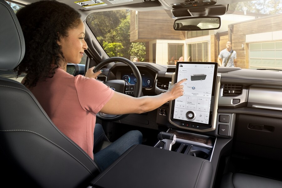 Woman interacting with the touchscreen