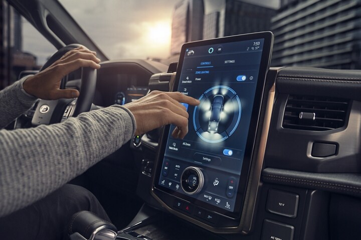 Driver adjusting the zone lighting on the touchscreen