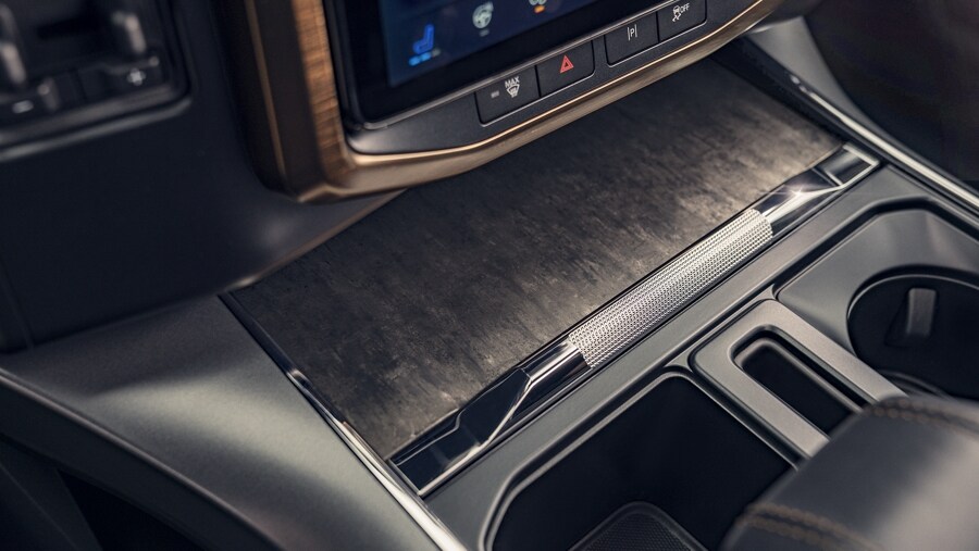 Close-up of center console showing the oak trim accents