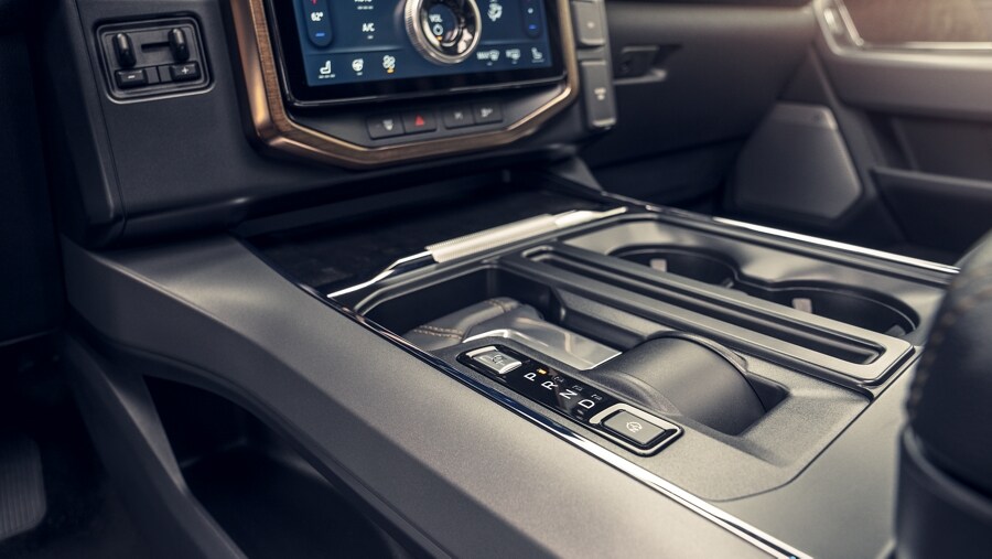 Center console shifter being stowed away