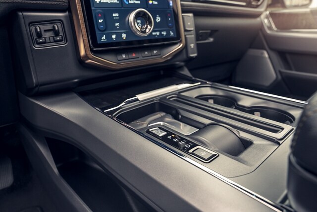 Center console shifter being stowed away
