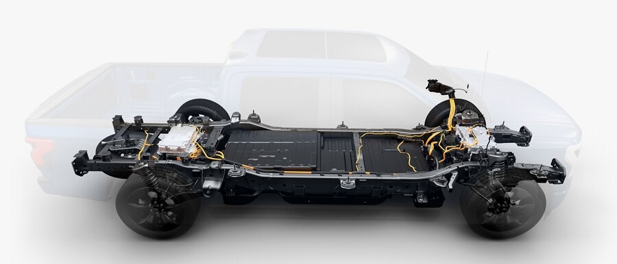 A see-through image of a 2023 Ford F-150 Lightning®  showing the battery and electric motors