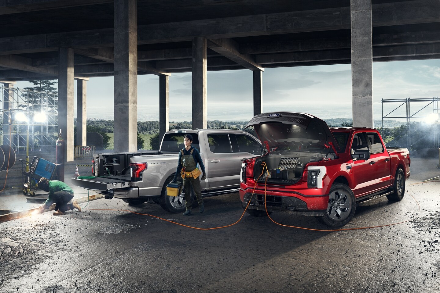 Two welders using the 2024 Ford Lightning 2.4kw onboard power from the 14.1 cubic foot frunk and 5.5 foot truck bed