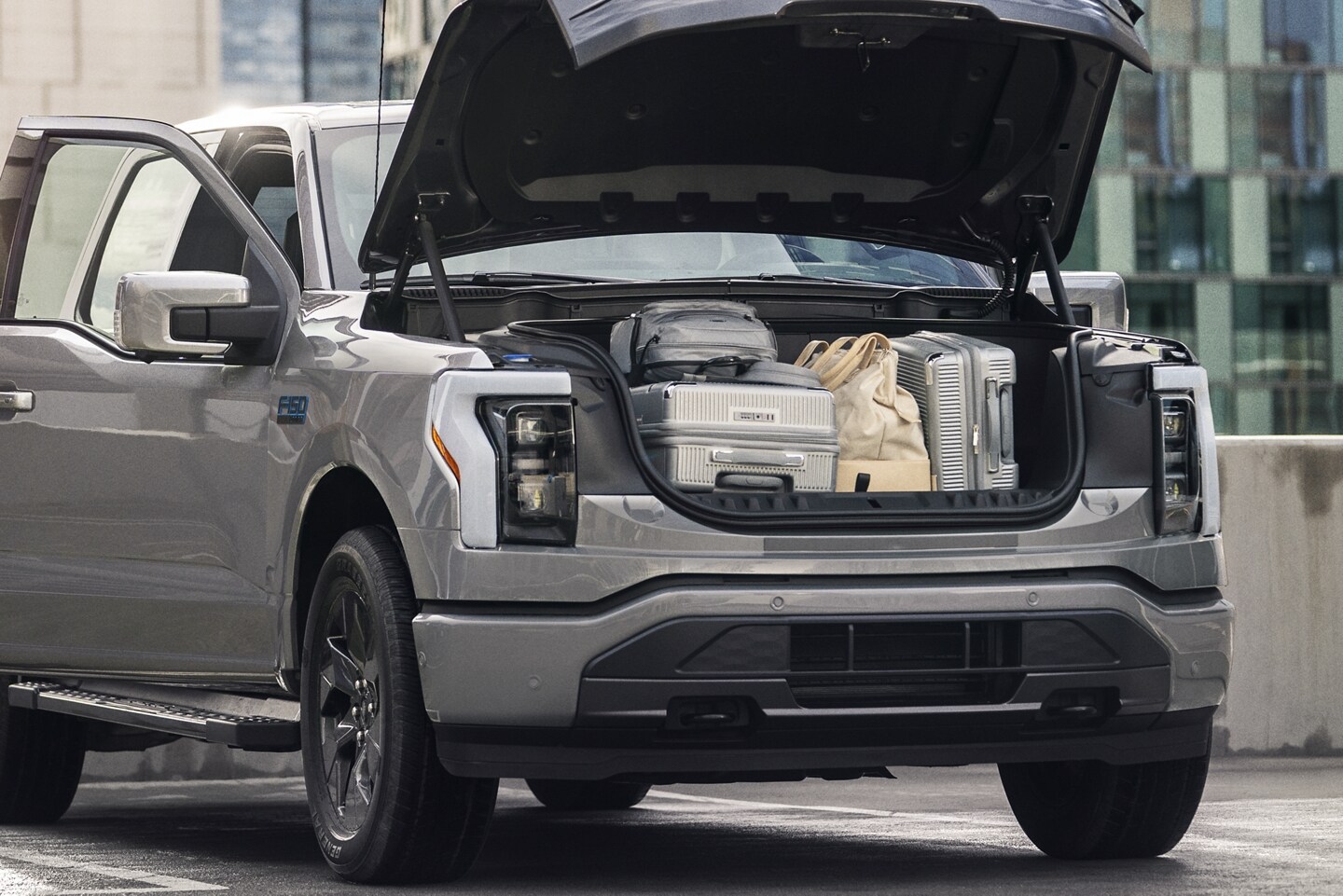 A 2024 Ford F-150 Lightning showcasing its front cargo space
