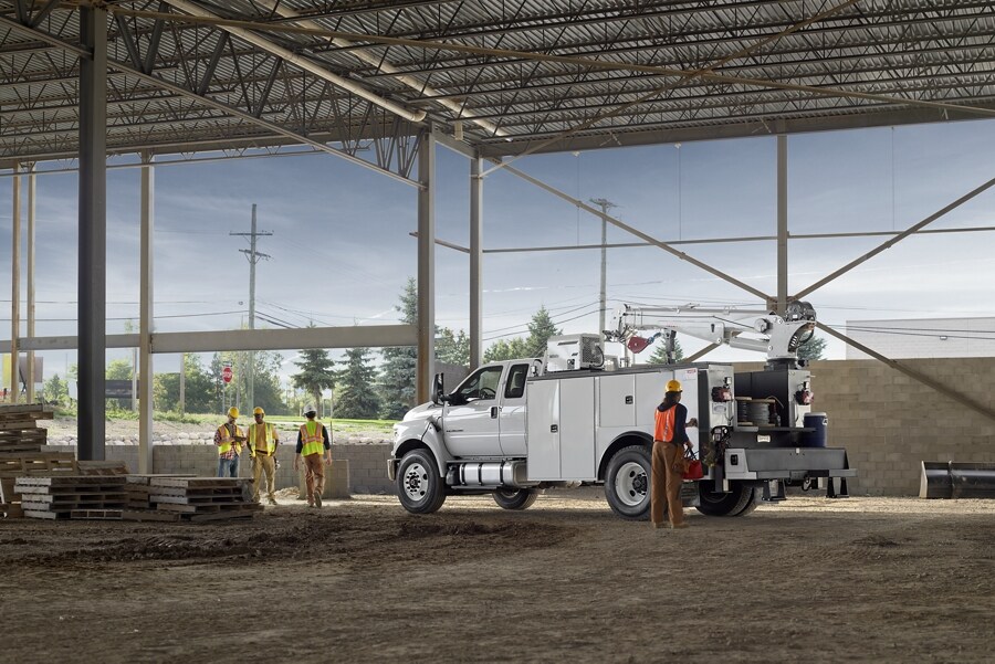 2024 Ford F-750 SuperCab in Oxford White with mechanic truck upfit at work site