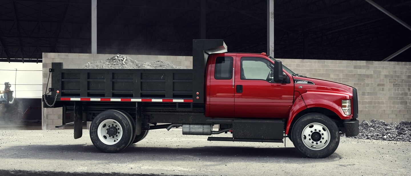 2026 Ford F-650 SuperCab shown in Race Red with dump truck upfit