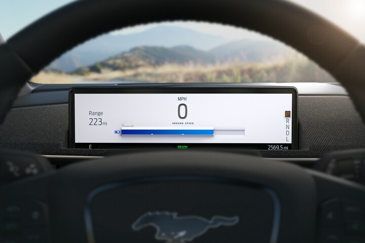 Intelligent Range display behind the wheel of a 2023 Ford Mustang Mach-E®