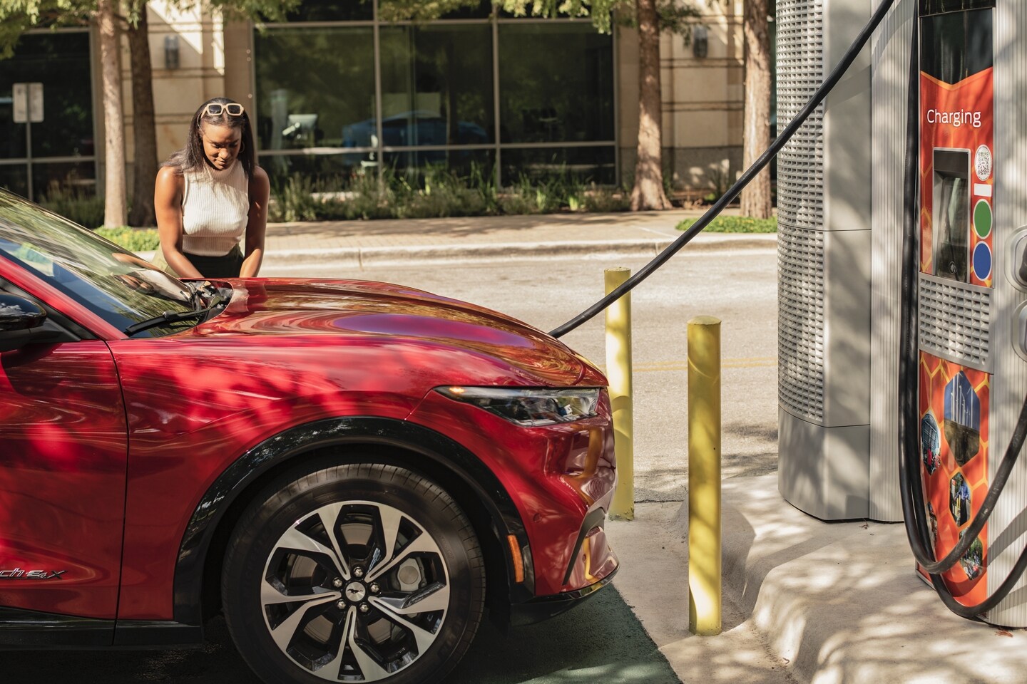 New 2024 Ford Mustang Being Charged By An Attractive Young Woman In Fairfax Virginia